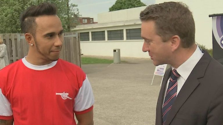 Lewis Hamilton, wearing a classic Arsenal shirt, chats to Sky Sports News HQ's Craig Slater