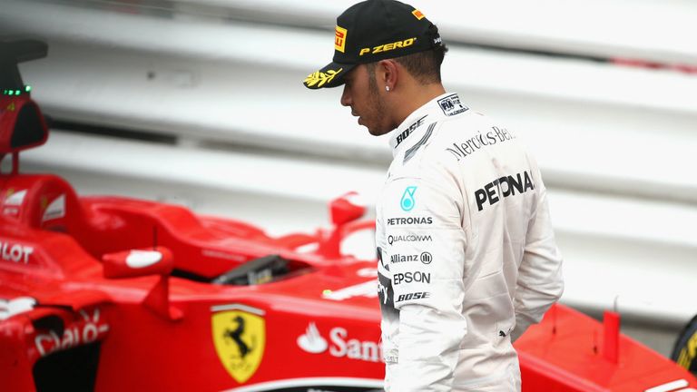 Lewis Hamilton trudges away from the Monaco podium