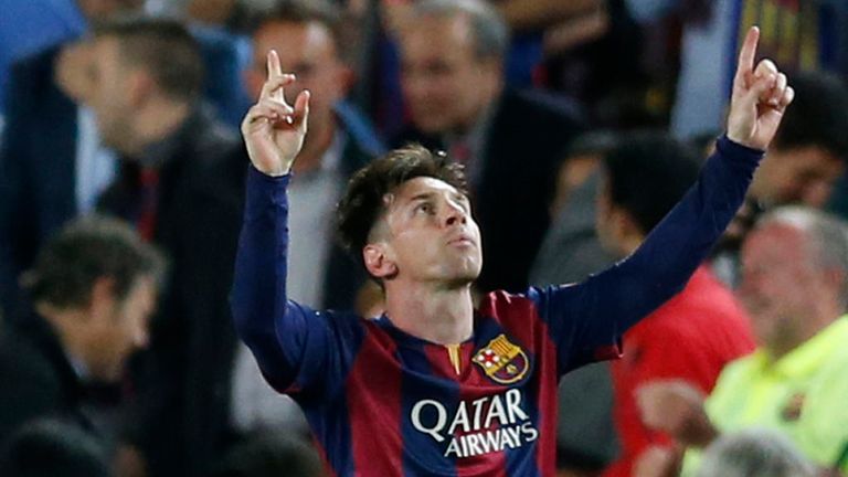 Barcelona's Lionel Messi celebrates after scoring the opening goal