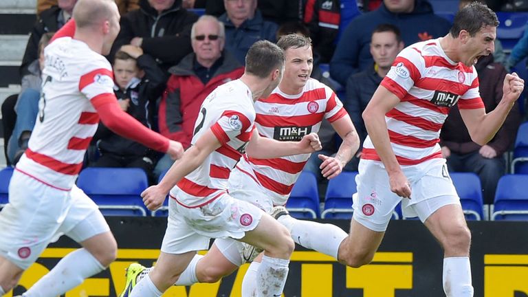 Lucas Tagliapietra (r) celebrates after putting Hamilton ahead at the  Victoria Ground