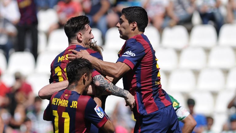Luis Suarez (right) celebrates after scoring for Barcelona