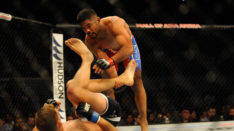 MANILA, PHILIPPINES - MAY 16:  Mark Munoz grapples with Luke Barnatt during their bout at the UFC Fight Night event at the Mall Of Asia Arena on May 16, 20