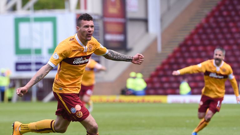 Motherwell's Marvin Johnson celebrates after putting his side 1-0 up against Rangers