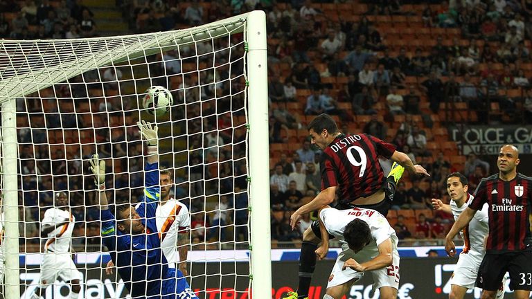 Mattia Destro heads home for AC Milan