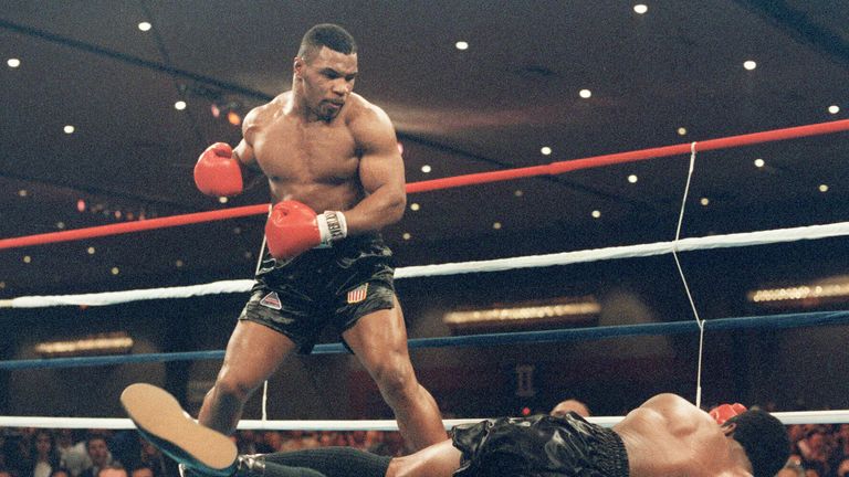 Las Vegas, UNITED STATES:  (FILES) A file picture taken 22 November 1986 in Las Vegas shows Mike Tyson (L) during his fight against heavyweight champion Tr