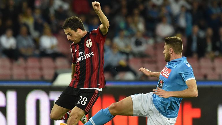 NAPLES, ITALY - MAY 03: Giacomo Bonaventura of Milan and David Lopez of Napoli in action during the Serie A match between SSC Napoli and AC Milan at Stadio