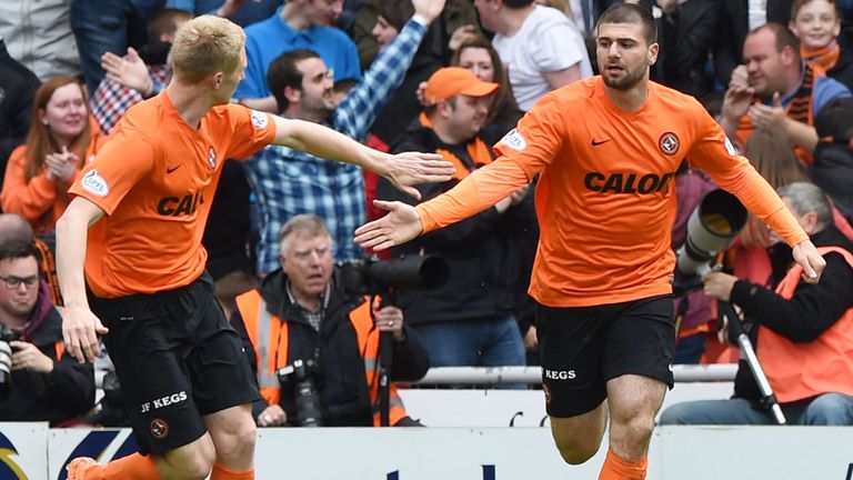 Nadir Ciftci (r) turns in celebration after firing Dundee United into an early lead