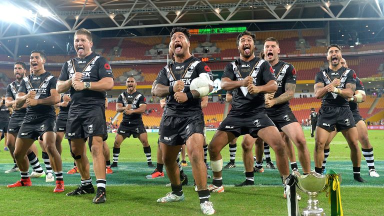 Issac Luke of the Kiwis leads his team into the Haka as they celebrate their victory 