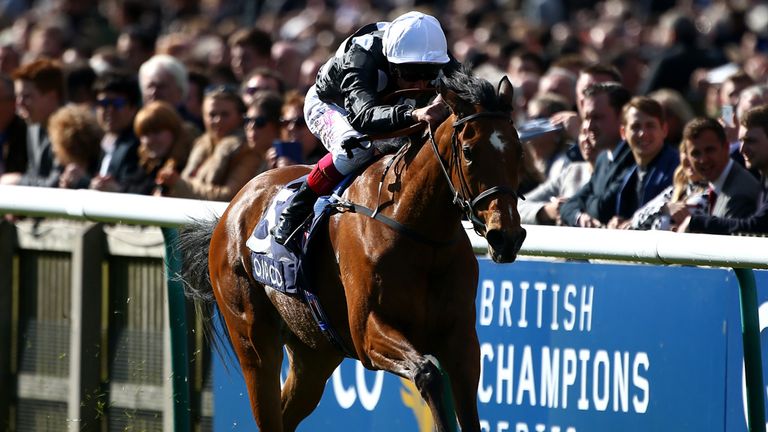 NEWMARKET, ENGLAND - MAY 03: Frankie Dettori rides Jazzi Top to win The Tweenhills Stallions Pretty Polly Stakes at Newmarket racecourse on May 03, 2015 in