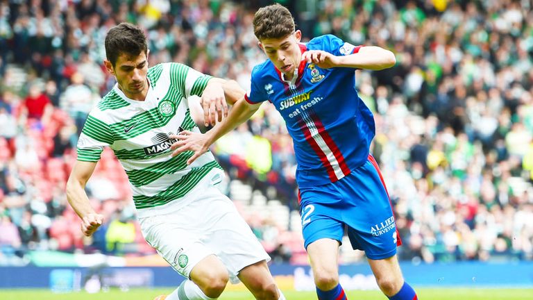 Nir Bitton of Celtic challenges Inverness Caley's Ryan Christie