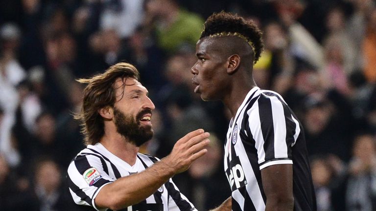 Juventus' French midfielder Paul Labile Pogba (R) celebrates after scoring a goal, with Juventus' midfielder Andrea Pirlo, during the Italian Serie A match