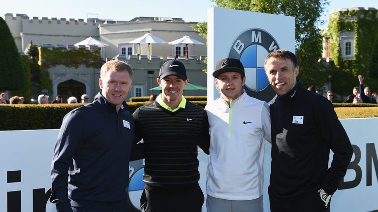 VIRGINIA WATER, ENGLAND - MAY 20:  Rory McIlroy of Northern Ireland poses with former Manchester United footballers Paul Scholes (L) and Phil Neville (R) a