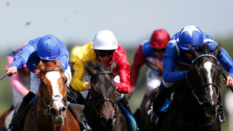 James Doyle riding Penhill (R) win The Leo Bancroft Signature Haircare Handicap Stakes at Ascot racecourse on May 09, 2015 in Asc