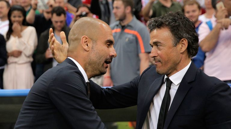 Pep Guardiola head coach of Bayern Munich greets Manager Luis Enrique of Barcelona