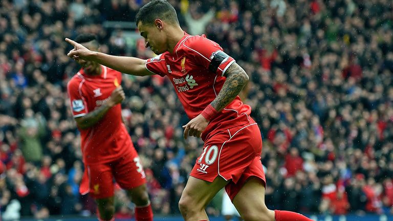 Liverpool's Philippe Coutinho celebrates after scoring against QPR