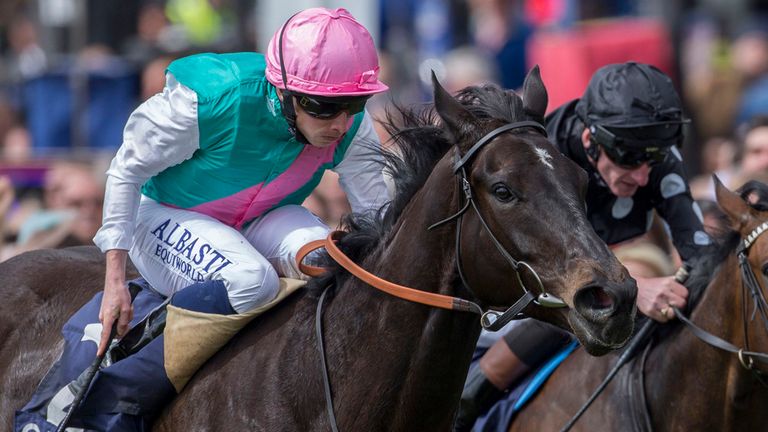 Bragging ridden by Ryan Moore (left) gets the better of Kleo ridden by Adam Kirby to win the Charm Spirit Dahlia Stakes Race run during the QIPCO 1000 Guin