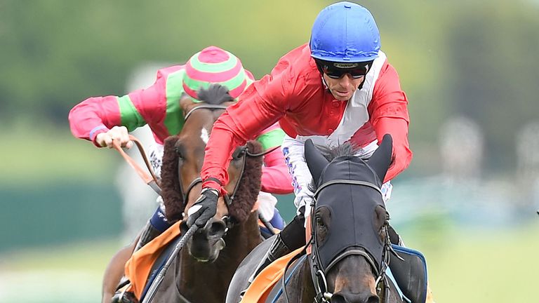 Kingsgate Native, ridden by Graham Lee, wins the 888sport Achilles Stakes at Haydock Park racecourse.