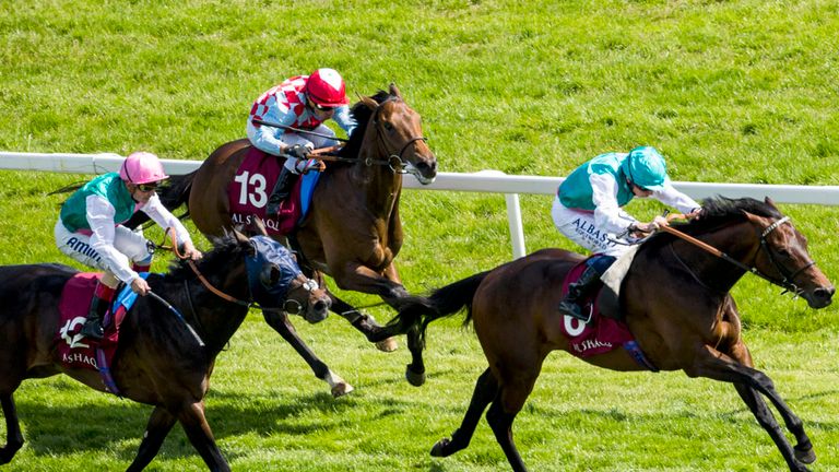 Time Test ridden by Ryan Moore leads the field home to win the Al Zubarah London Gold Cup at Newbury.