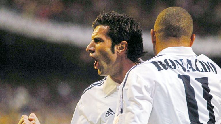 stupid-skunk802: luis figo wearing half real madrid and half barcelona  jersey taking action with fullbody view