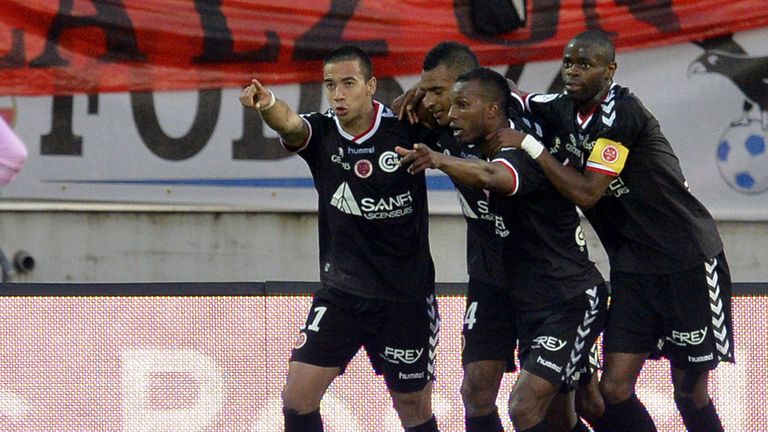 Reims and David Ngog celebrate