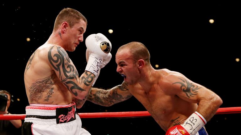 GLASGOW, SCOTLAND - SEPTEMBER 22:  Ricky Burns (L) in action with Kevin Mitchell during the WBO World Lightweight Championship match at SECC on September 2