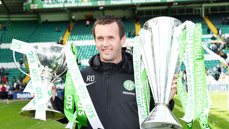 Celtic boss Ronny Deila with the two trophies he has won this season