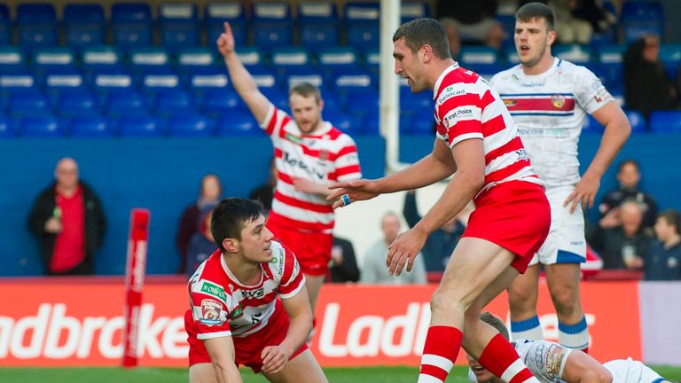 Halifax's James Saltonstall is congratulated after scoring against Wakefield.