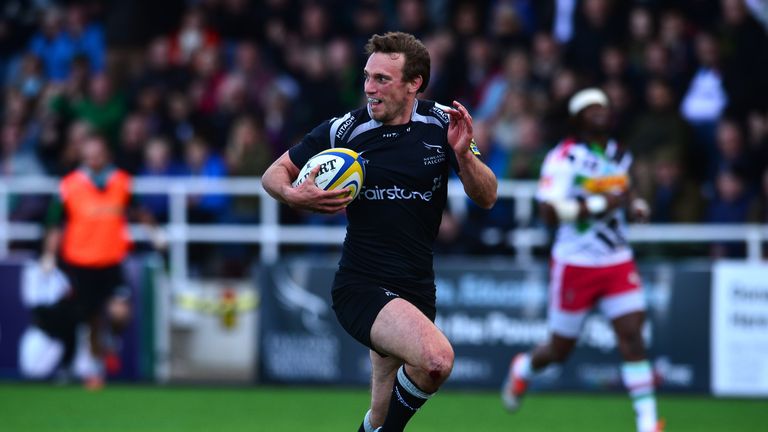 Mike Blair races clear to score a try on his final appearance for Newcastle