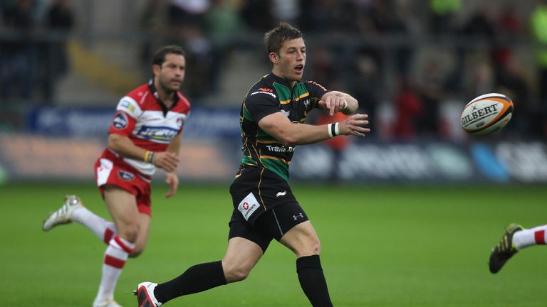 Ryan Glynn of Northampton Saints passes the ball in the match  against Gloucester during the J.P. Morgan Premiership Rugby 