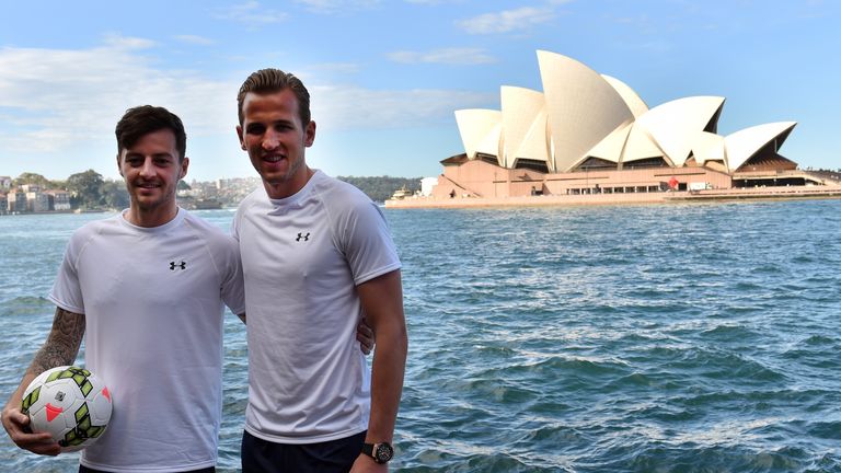 Tottenham Hotspur's players Harry Kane (R) and Ryan Mason pose for a pictures in front of Sydney Opera House on May 28, 2015