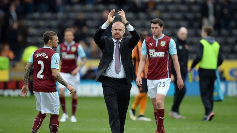 Burnley's English manager Sean Dyche (C) applauds the team's fans after his team was relegated from the Premier League
