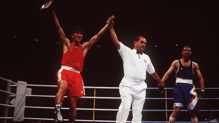 Serafim Todorov looks dejected after losing to Thailand's Somluck Kamsing in the 47kg final at the Atlanta Olympics
