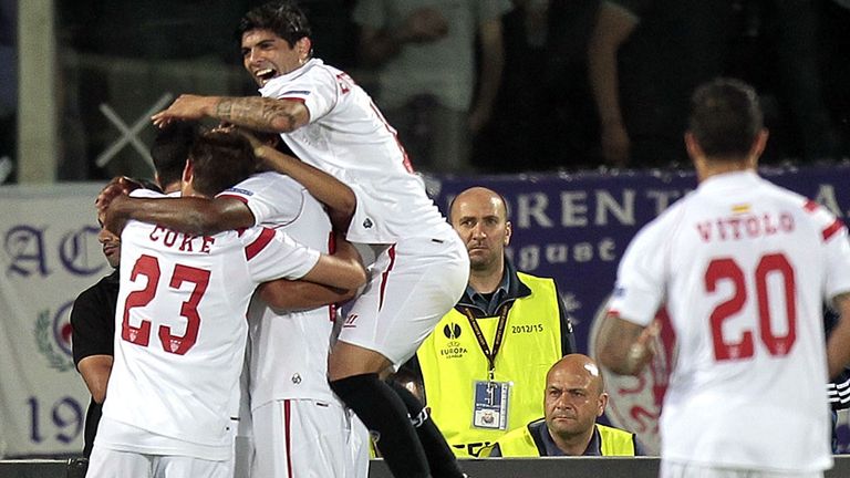 FLORENCE, ITALY - MAY 14: Sevilla players celebrate a goal scored by Carlos Bacca during the UEFA Europa League Semi Final match between ACF Fiorentina and