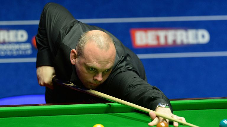 Stuart Bingham in action in his semi final match against Judd Trump during day fifteen of the Betfred World Championships at the Crucible Theatre, Sheffiel