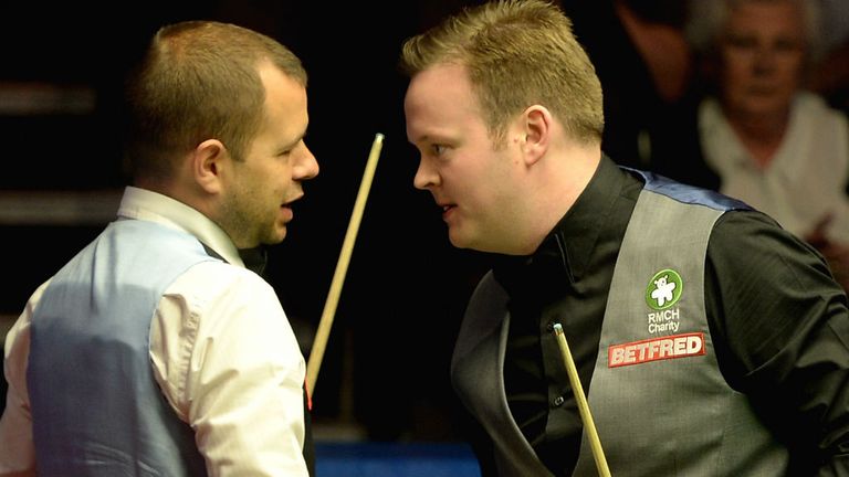 Shaun Murphy shakes hands with Barry Hawkins after defeating him during their semi final at the 2015 World Snooker Championship