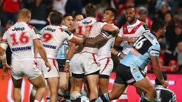 St George Illawarra players celebrate a try