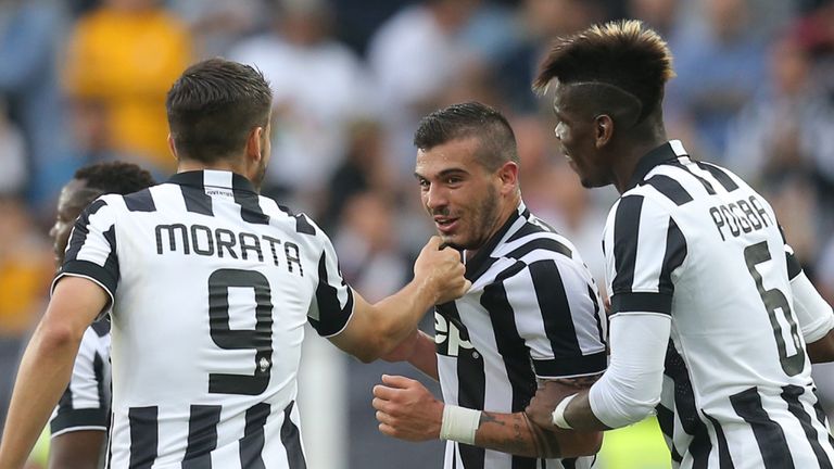 Juventus midfielder Stefano Sturaro celebrates with his team-mates