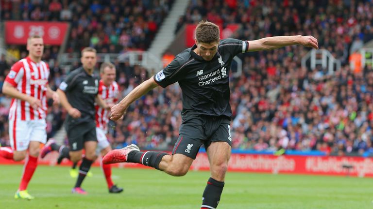 STOKE ON TRENT, ENGLAND - MAY 24:  Steven Gerrard of Liverpool scores his team's first goal  during the Barclays Premier League match between Stoke City an