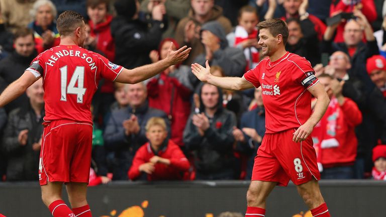 Liverpool captain Steven Gerrard celebrates Jordan Henderson