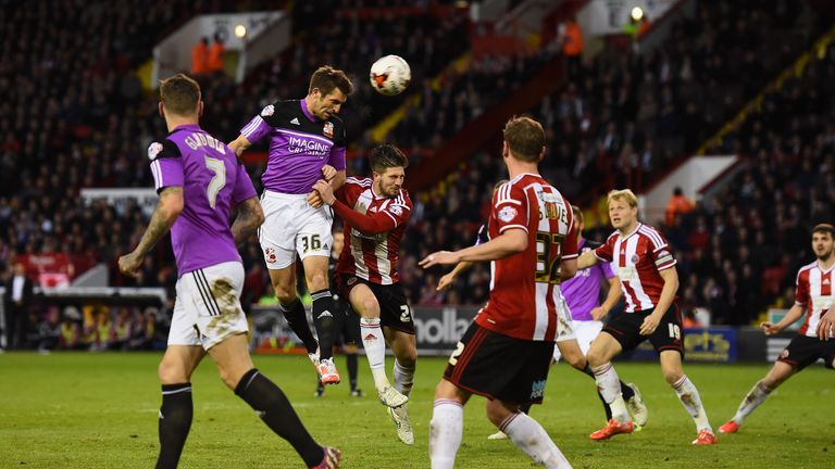SHEFFIELD, ENGLAND - MAY 07: Sam Ricketts of Swindon Town scores the equalising goal during the Sky Bet Championship semi final match first leg match betwe
