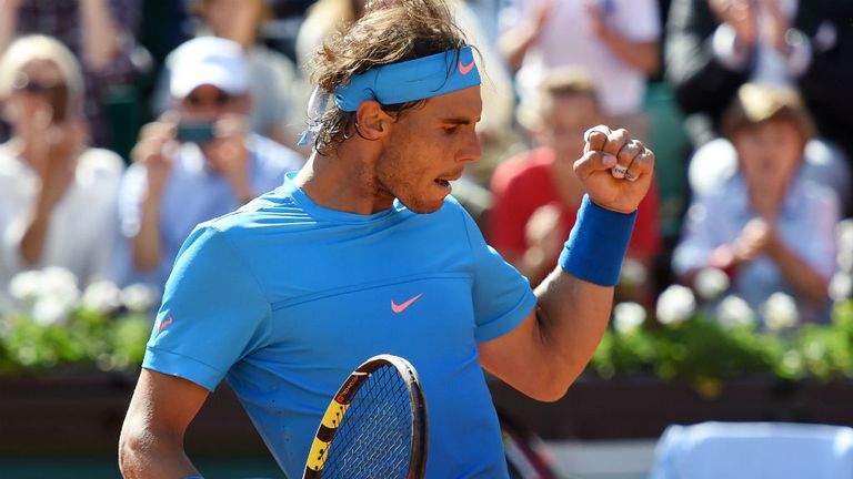 Rafael Nadal celebrates after defeating Russia's Andrey Kuznetsov at the French Open 