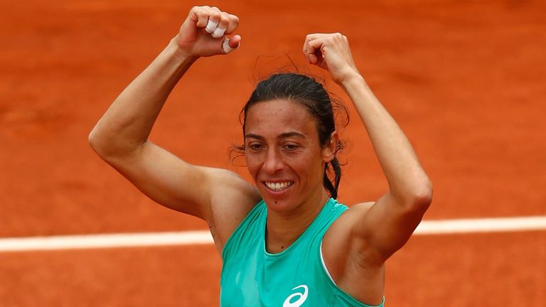 Francesca Schiavone celebrates match point against Svetlana Kuznetsova at the 2015 French Open 