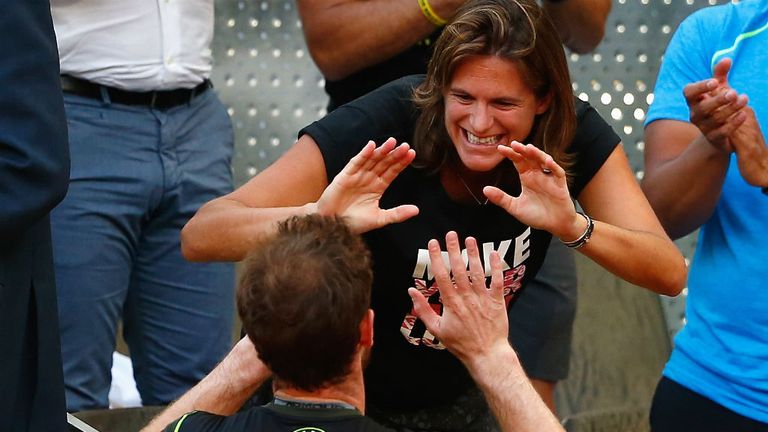 Andy Murray celebrates with coach Amelie Mauresmo after the Mutua Madrid Open