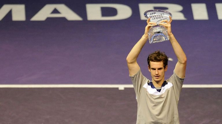 Andy Murray holds up the trophy after beating Gilles Simon in the final of the Madrid masters 2008