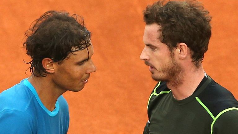 Andy Murray  shakes hands at the net after his straight sets victory against Rafael Nadal in the Mutua Madrid Open final