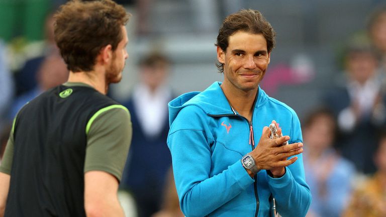 Andy Murray is applauded by Rafael Nadal after his straight sets victory in the Mutua Madrid Open final