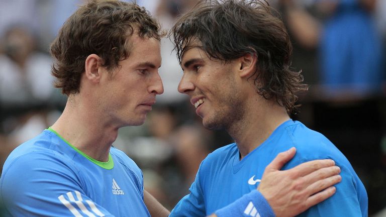 Rafael Nadal (R) reacts after winning over Andy Murray during French Open at Roland Garros in 2011