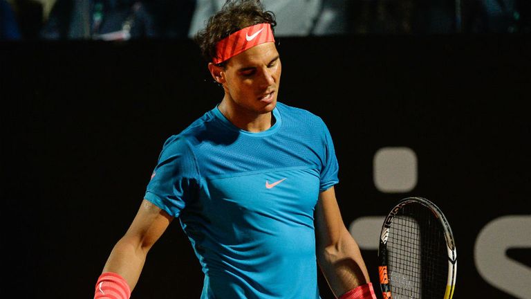 Rafael Nadal reacts as he loses a point against Stan Wawrinka during their ATP Tennis Open match in Rome