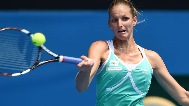 Karolina Pliskova returns a shot to Oceane Dodin during on day three of the 2015 Australian Open 