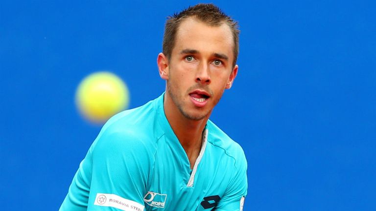 Lukas Rosol plays a back hand during his quarter final match against Andy Murray at the BMW Open